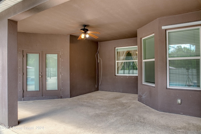 view of patio / terrace with ceiling fan and french doors