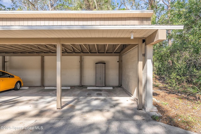 view of car parking featuring a carport