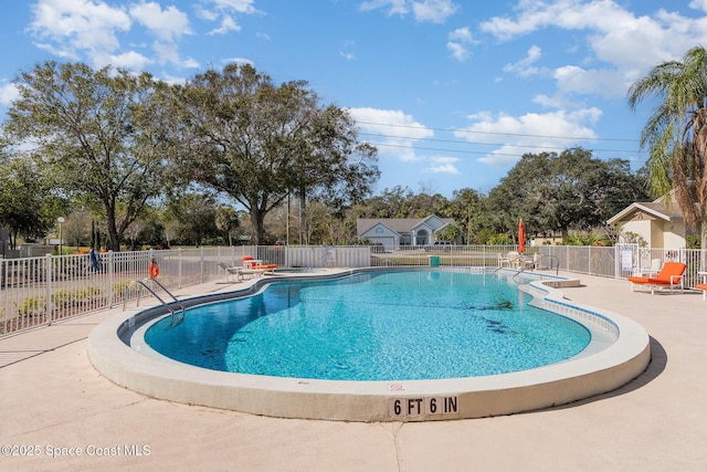 view of pool featuring a patio area