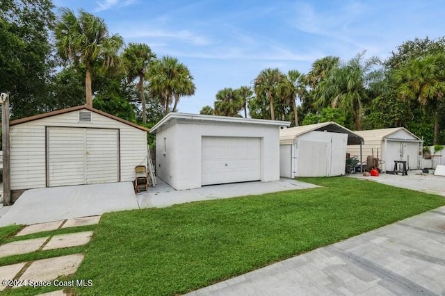 garage featuring a lawn