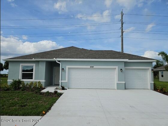 ranch-style house with a garage