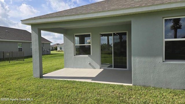 4346 Kelsey Ln, Sebastian, FL 32976 - back of property with a patio area, stucco siding, and a shingled roof