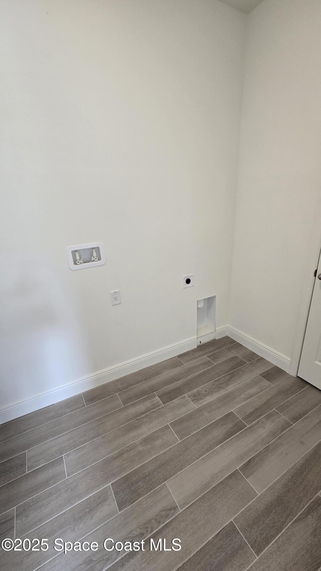 4346 Kelsey Ln, Sebastian, FL 32976 - washroom with hookup for a washing machine, wood finish floors, and electric dryer hookup