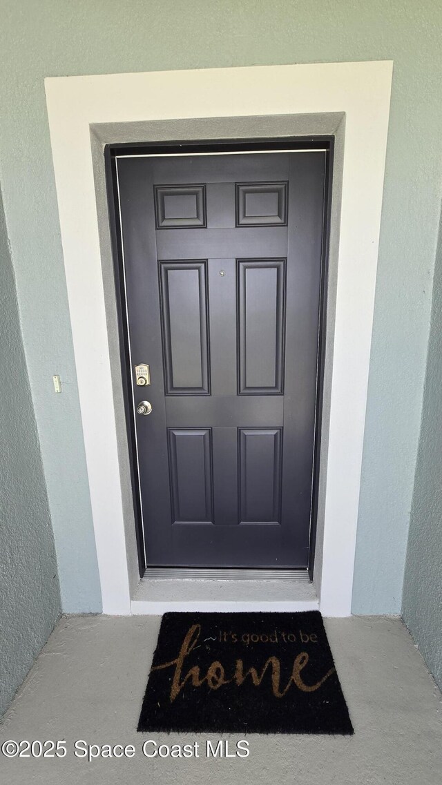 4346 Kelsey Ln, Sebastian, FL 32976 - entrance to property featuring stucco siding