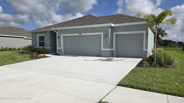 4346 Kelsey Ln, Sebastian, FL 32976 - single story home featuring a garage, stucco siding, roof with shingles, driveway, and a front yard