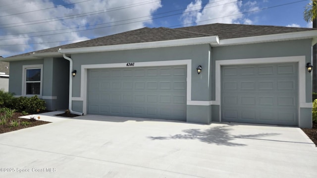 4346 Kelsey Ln, Sebastian, FL 32976 - view of side of property with a garage, driveway, stucco siding, and a shingled roof