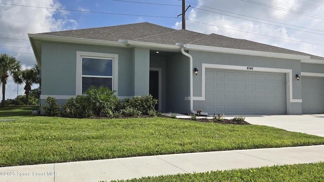 4346 Kelsey Ln, Sebastian, FL 32976 - view of front of home featuring a garage, stucco siding, a front yard, and concrete driveway
