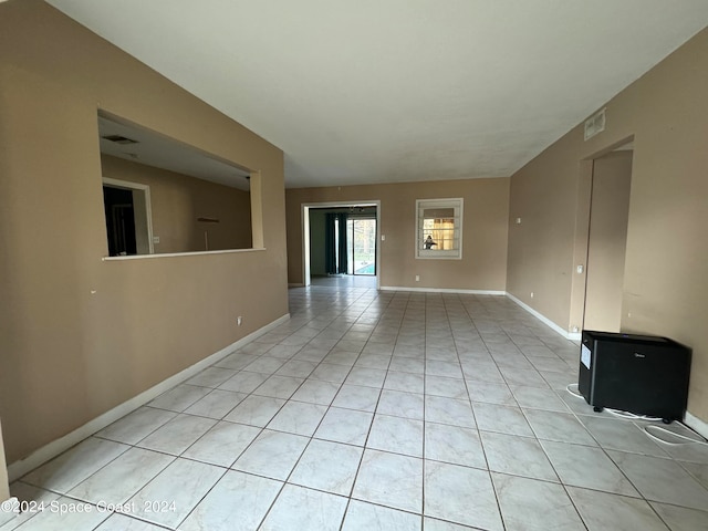 interior space with light tile patterned floors