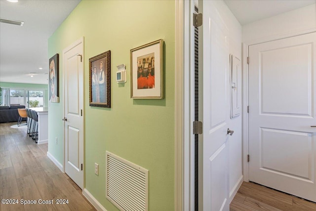 1447 Colebrook Cir SW, Palm Bay, FL 32908 - hallway with wood finished floors and baseboards
