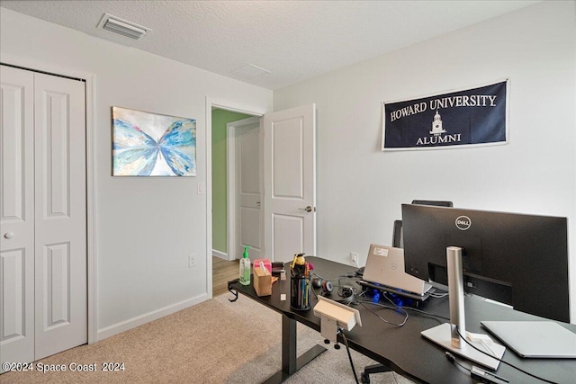 1447 Colebrook Cir SW, Palm Bay, FL 32908 - carpeted home office with baseboards and a textured ceiling