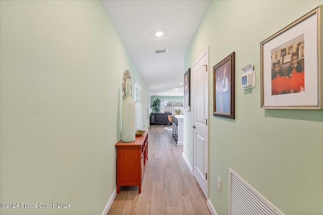 1447 Colebrook Cir SW, Palm Bay, FL 32908 - hall with light wood-type flooring, baseboards, and recessed lighting