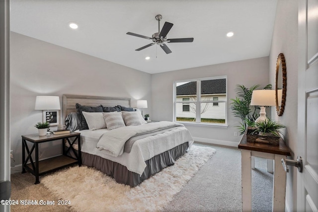 carpeted bedroom featuring ceiling fan