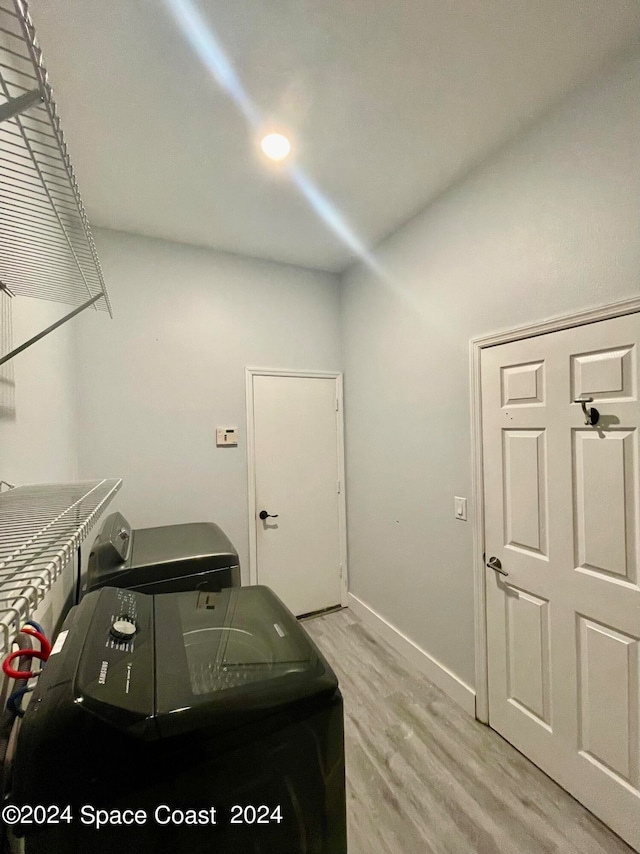 garage with washer and dryer