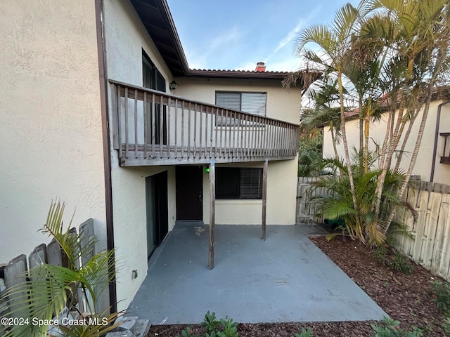 back of property with a patio area