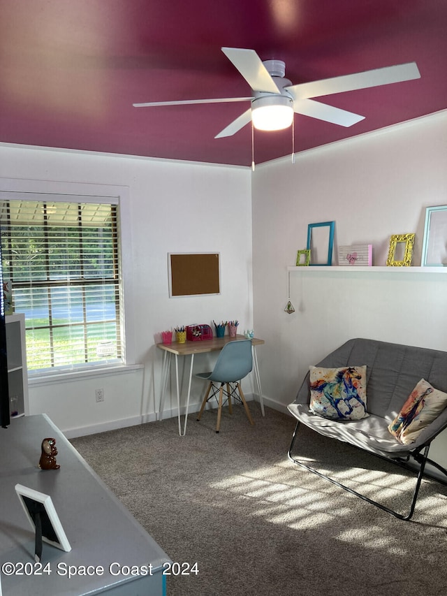 carpeted home office with ceiling fan