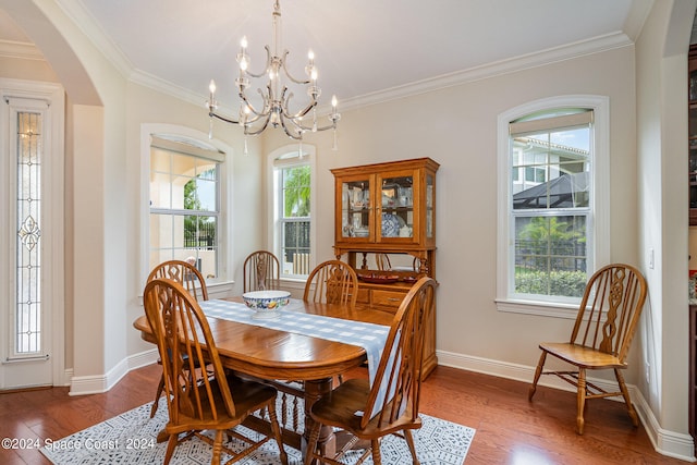 dining space featuring a chandelier, hardwood / wood-style floors, and a wealth of natural light