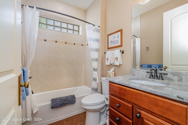 full bathroom featuring shower / tub combo with curtain, tile patterned flooring, vanity, and toilet