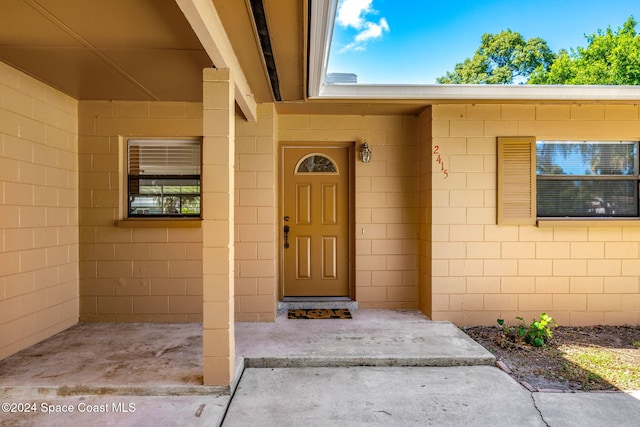 2415 Stanford Dr, Cocoa, FL 32926 - property entrance with concrete block siding