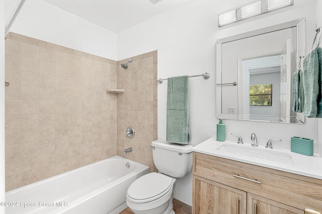 2415 Stanford Dr, Cocoa, FL 32926 - bathroom with toilet, vanity, and  shower combination