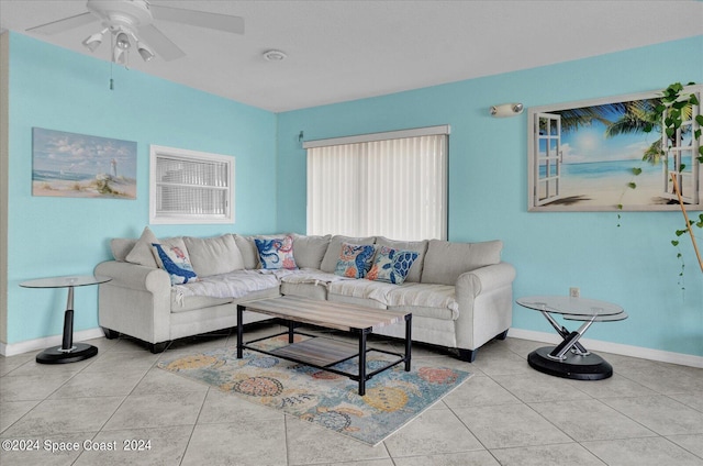 living room with light tile patterned floors and ceiling fan