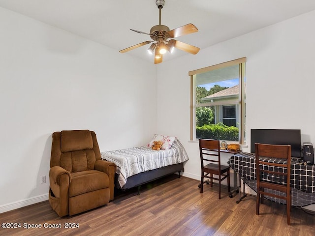 bedroom with ceiling fan and hardwood / wood-style floors