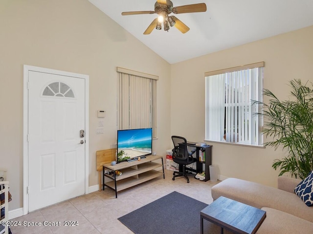 living room with ceiling fan, light tile patterned flooring, and vaulted ceiling