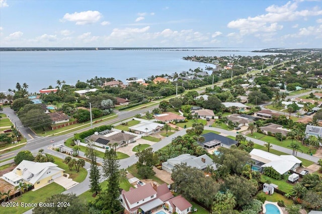 bird's eye view with a water view