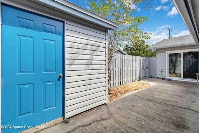 property entrance with a patio