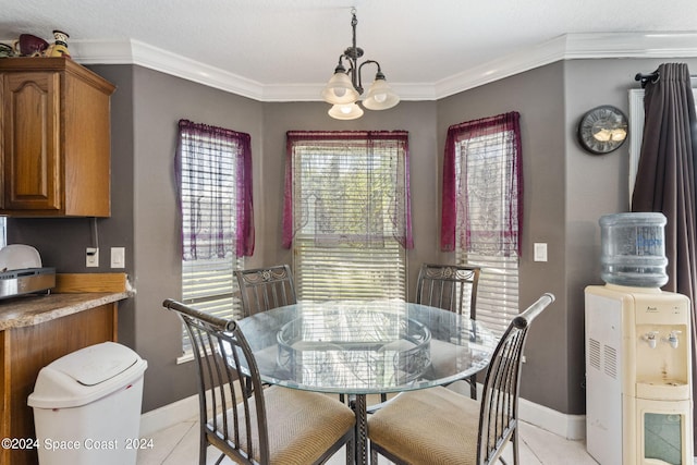 dining room featuring ornamental molding, a notable chandelier, and light tile patterned floors