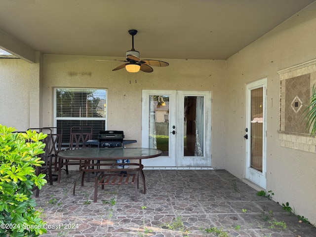 view of patio featuring ceiling fan