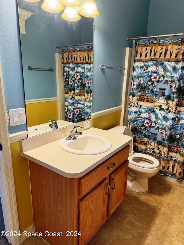 1870 Parrsboro St NW, Palm Bay, FL 32907 - full bath featuring curtained shower, vanity, tile patterned flooring, and toilet