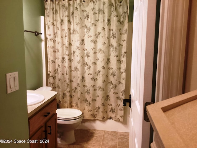 1870 Parrsboro St NW, Palm Bay, FL 32907 - full bathroom featuring tile patterned flooring, toilet, and vanity