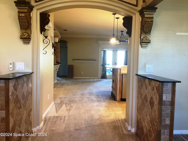 1870 Parrsboro St NW, Palm Bay, FL 32907 - hallway with arched walkways, carpet, baseboards, and ornamental molding