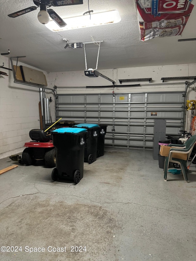 1870 Parrsboro St NW, Palm Bay, FL 32907 - garage featuring ceiling fan and a garage door opener