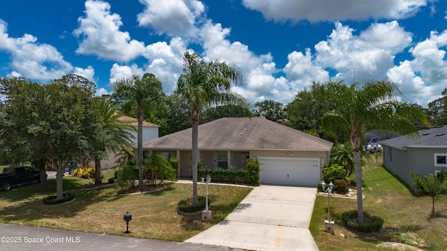 1870 Parrsboro St NW, Palm Bay, FL 32907 - single story home featuring an attached garage, concrete driveway, and a front yard