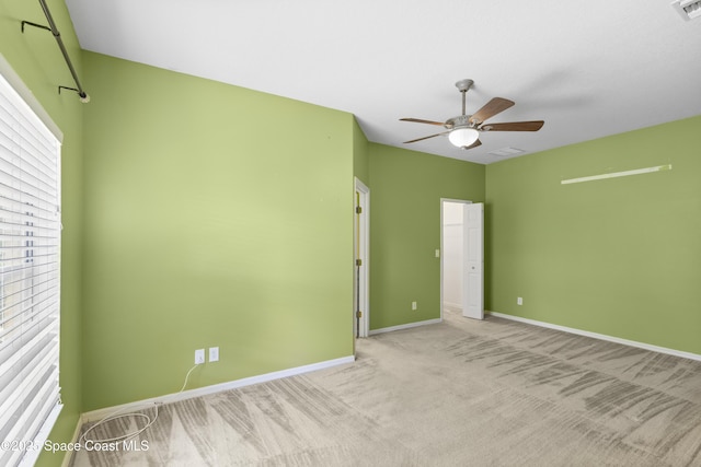 1870 Parrsboro St NW, Palm Bay, FL 32907 - empty room with ceiling fan and carpet floors