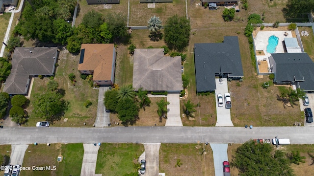 1870 Parrsboro St NW, Palm Bay, FL 32907 - aerial view of property's location featuring a pool area and nearby suburban area