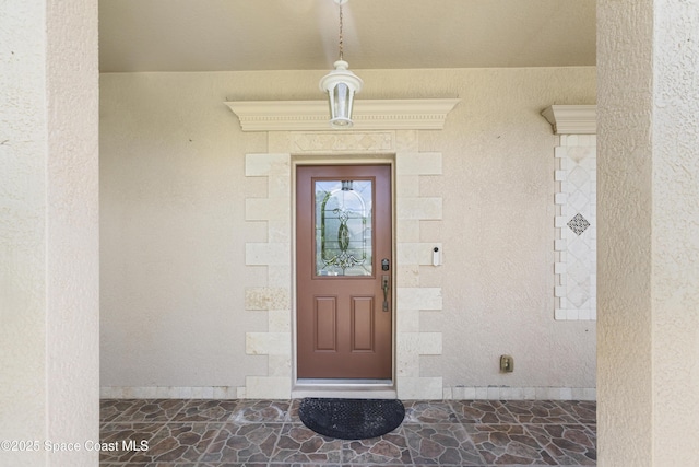 1870 Parrsboro St NW, Palm Bay, FL 32907 - view of exterior entry with stucco siding