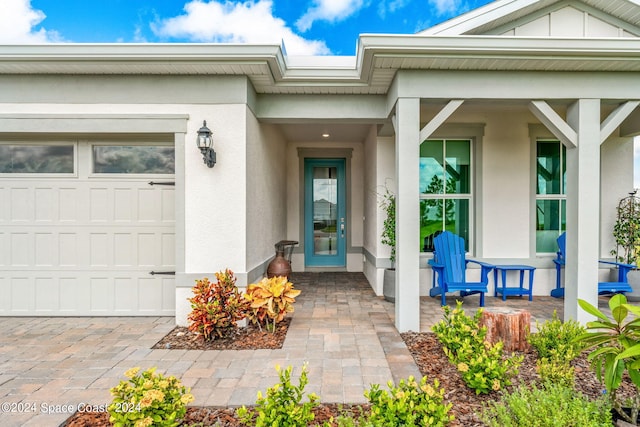 entrance to property featuring a garage