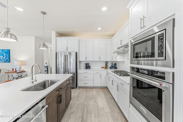 kitchen with white cabinets and stainless steel appliances