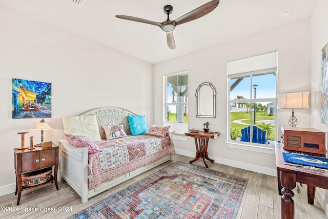 bedroom featuring ceiling fan and light wood-type flooring