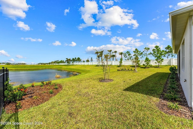 view of yard with a water view