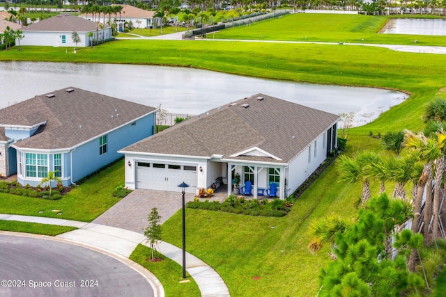 drone / aerial view featuring a water view