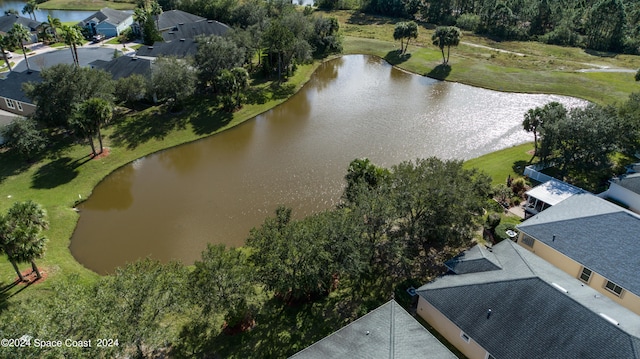 drone / aerial view with a water view