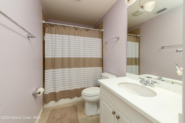 full bathroom featuring shower / bath combo, vanity, toilet, and tile patterned floors