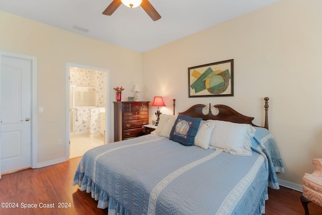 bedroom with ceiling fan, ensuite bathroom, and hardwood / wood-style floors