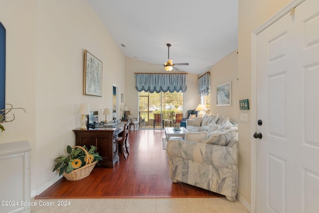 living room featuring light wood-type flooring and ceiling fan