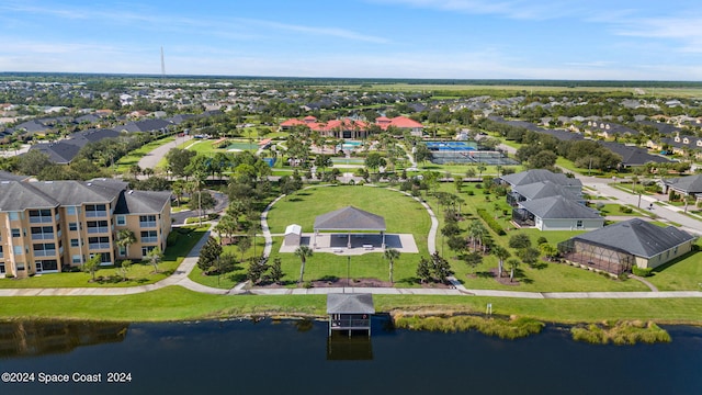 bird's eye view with a water view