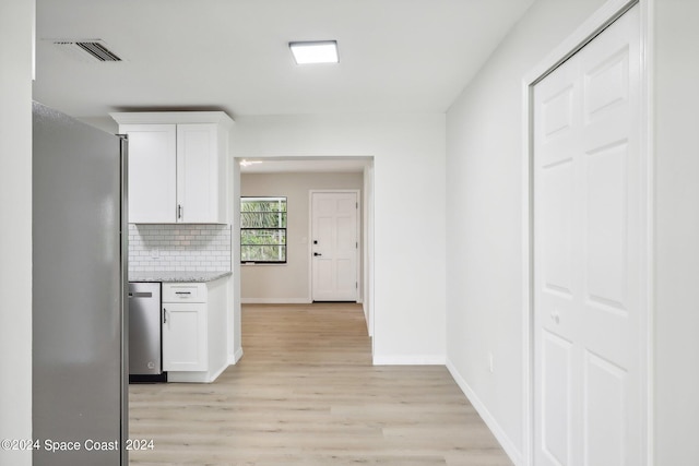 hall featuring light wood-type flooring