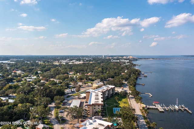 drone / aerial view with a water view